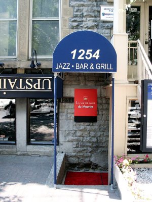 Montreal Jazz Bar  Grill with upside down sign