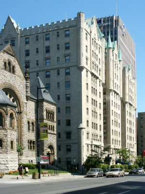 Montreal stone church next to modern buildings