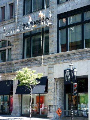 Montreal workers on scaffolding