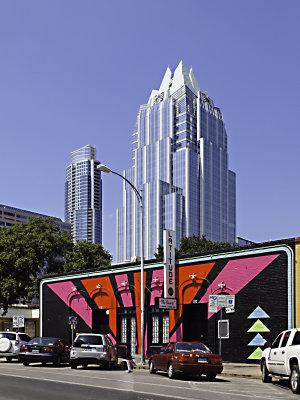 The frost bank building towers over the Latitude nightclub.