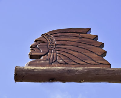 Wood carving at entrance to Inn
