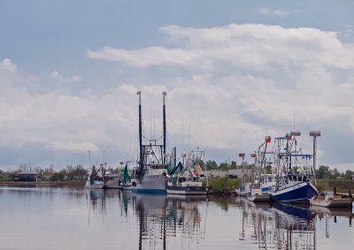 Shrimp boats on the bayou near Holly Beach, LA
