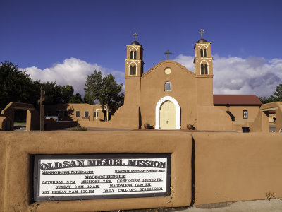 The Mission proper with sign.