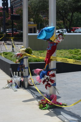 Memorial outside the Bank of America withFlowers and other items