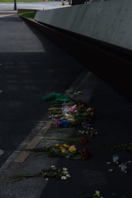 flowers left at the Dallas Police Memorial