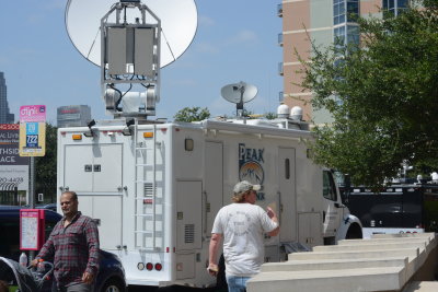 A few of the many sattelite trucks in front of Dallas Police Headquaters doing live broadcasts