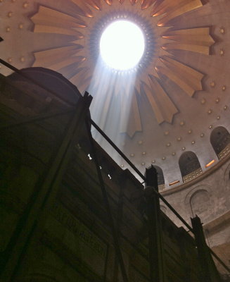 Sunlight shining on Tomb through ceiling of Church