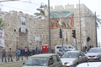 New Gate to the Old City, with a Palm Sunday banner.