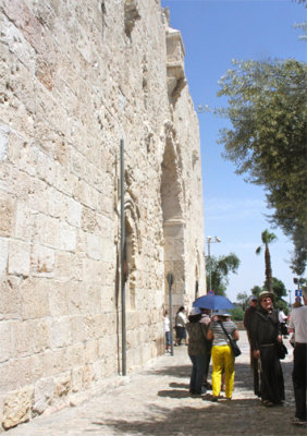 Zion Gate, riddled with bullet holes from the War of Independence in 1948.  This is the entrance to Jewish Quarter. 