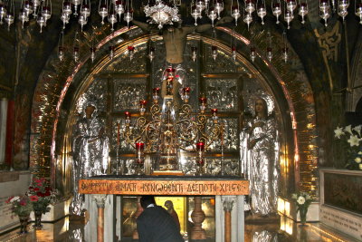 Calvary, where Jesus was crucified. Under the altar is a place where the Rock of Calvary can be touched. Luis here.