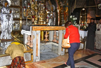 Orthodox altar at Calvery.  The altar that the Roman Catholics use for Mass is to the right, just behind the man in black.  