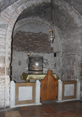 Adam's Chapel directly beneath the rock on which the cross stood and which split at the end of the crucifixion. 