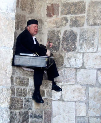 Street (or wall) minstrel at Zion Gate