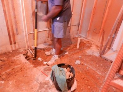 Tim moving the shower drain