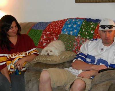 Couple divided by football