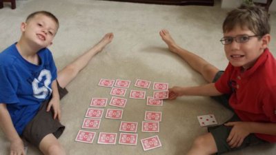 Boys playing cards