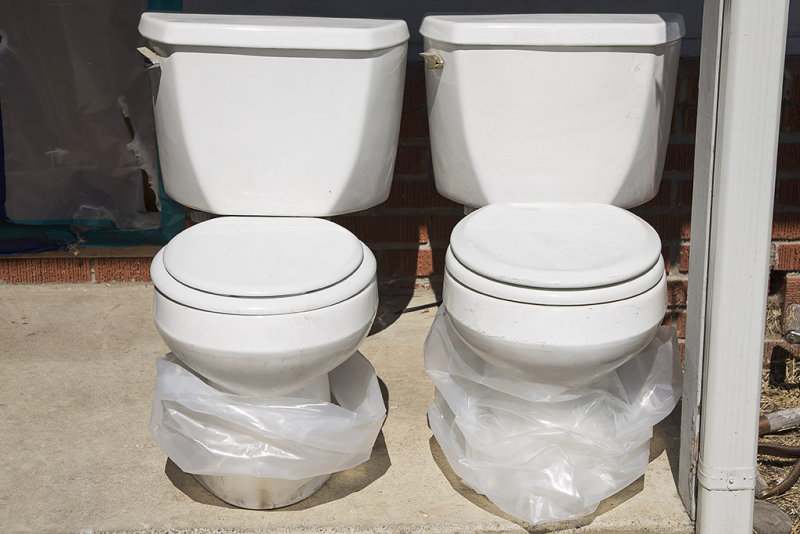 Two old Kohler Northline Toilets 3.5 gpf