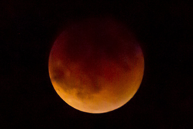 9/27/2015  Supermoon lunar eclipse through clouds