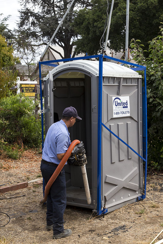 Cleaning the porta potty