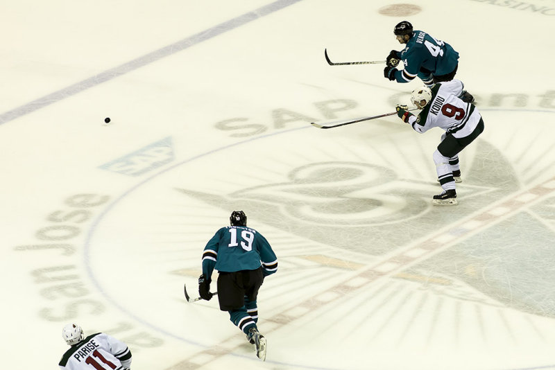 Mikko Koivu shoots toward the empty net
