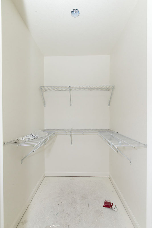 Master bedroom closet with wire shelves