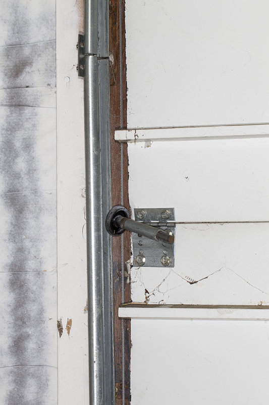 Garage door hardware needs replacement or repair