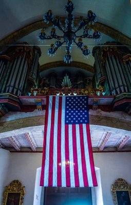 American flag hanging in Mission Carmel Catholic church on the 4th of July _MG_2537.jpg