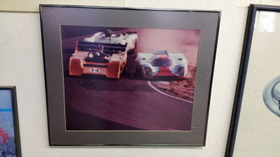 Gary Arentz at the controls of his McLaren (JT in Otis Chandler's 917K on the dirt with no brakes!) Photo 1