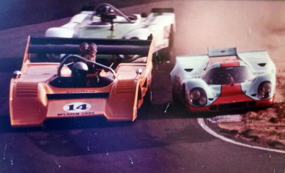 Gary Arentz at the controls of his McLaren (JT in Otis Chandler's 917K on the dirt with no brakes!) Photo 2