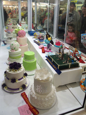 Cakes behind glass