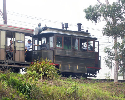 Steam tram with passengers