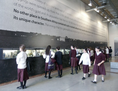0190: Uniformed white schoolgirls at the Apartheid Museum