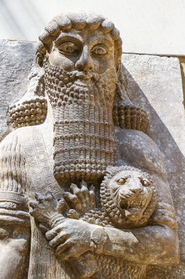 IMG_2893 Assyrian  Guardian figure holding a lion.jpg