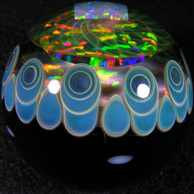 The opal in the middle is a huge 30mm wonder. The smaller 2nd opal is seen here from the side w/ fumacello between top 2 opals.