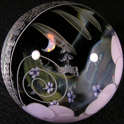 Dan created the fumed landscape and flower milli around it, and Jared encased it all.