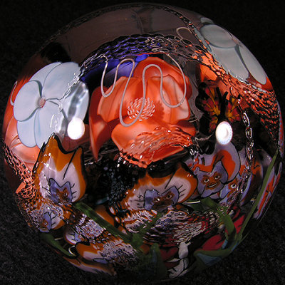 This marble is large and INCREDIBLE. Jared packed Grimm's Alice in Wonderland theme into this wonderland of a marble.