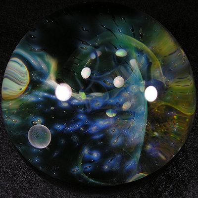 This is an unbelievable Universe marble from Gateson featuring FOUR inclusions by Travis Weber!