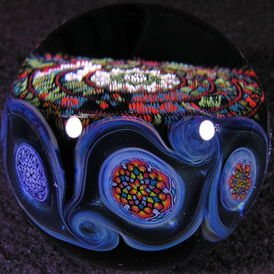 Josh put the marble together on the last day of the show, masterful, incorporating 8 of Jun's milli around the equator.
