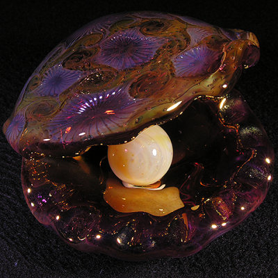 The Golden Oyster Size: 2.92 x 2.32 Pearl - 0.76 Price: SOLD 