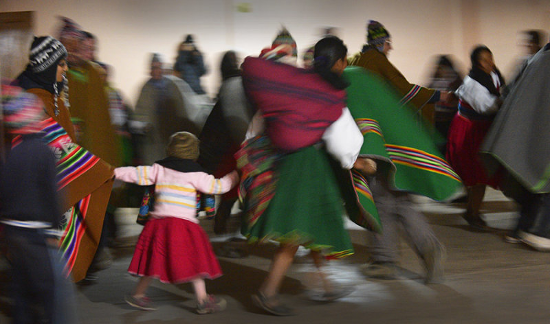 Community dancing at night . Amantani island