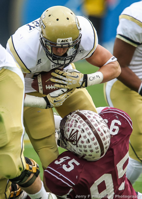 GT RB Zach Laskey tries to get by AAMU DL Reginald Bailey