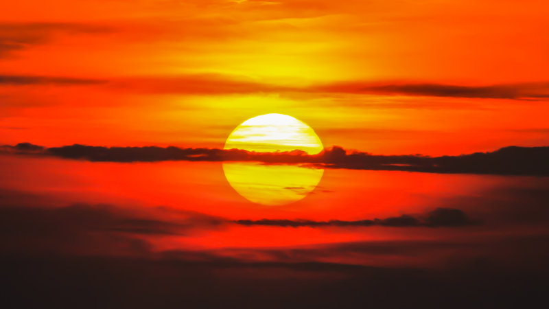 The sun, cloaked by early morning clouds, from Cadillac Mountain in Acadia National Park