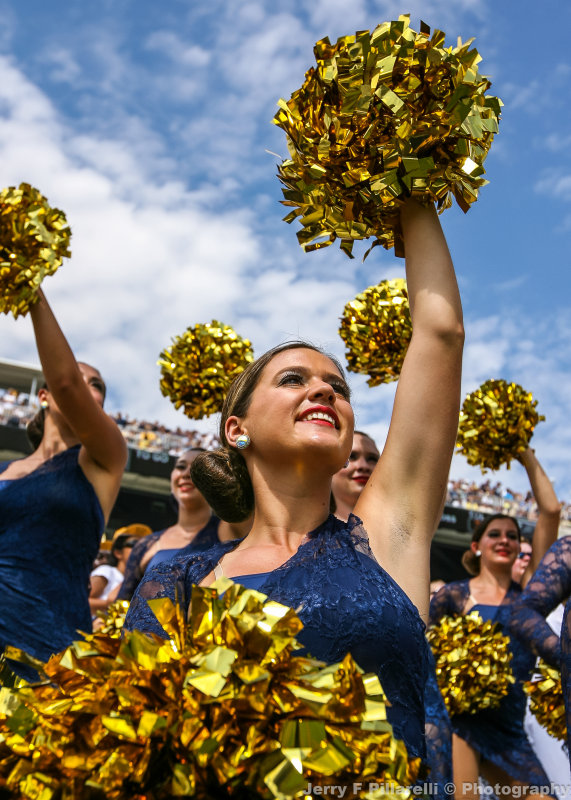 Tech Flag team member works the crowd during the game