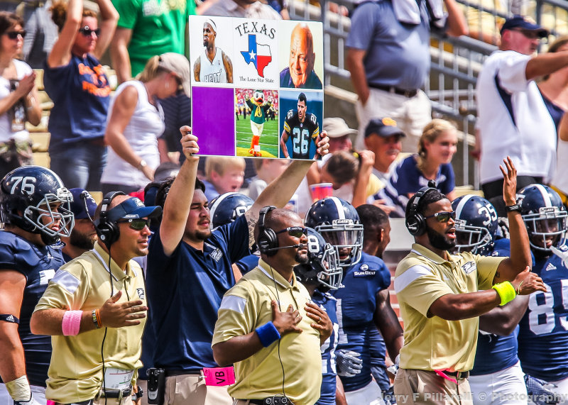 Georgia Southern Coaches signal in an offensive play