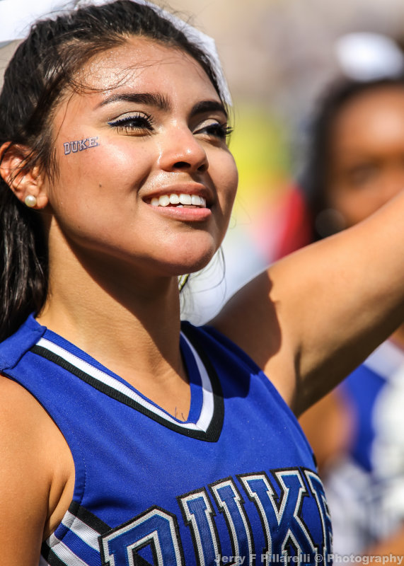 Blue Devils Cheerleader performs during the game