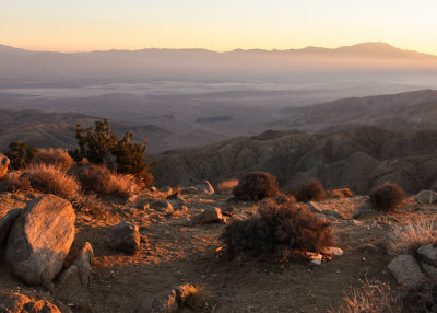 The sun sets on the Coachella Valley as seen from Keys View in Joshua Tree National Park