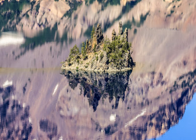 Close up of the Phantom Ship and its reflection in Crater Lake National Park