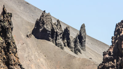 Volcanic rock formations on the steep flanks of Hillman Peak in Crater Lake National Park