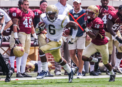 Georgia Tech DB Chris Milton races down the sidelines with an intercepted pass