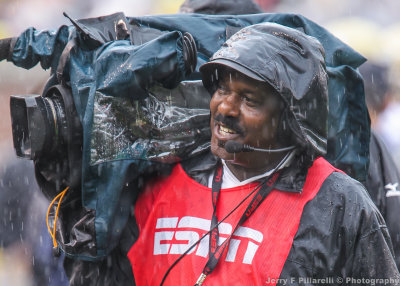 ESPN cameraman is well protected from the elements